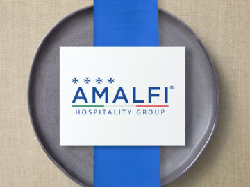 Amafi hospitality group logo on a plate.