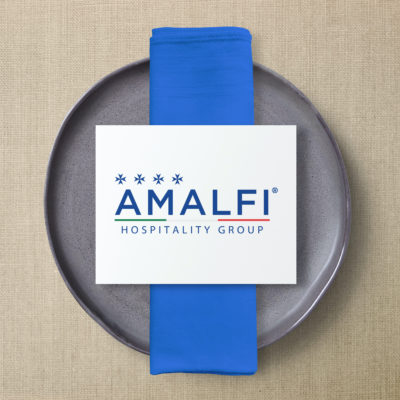 Amafi hospitality group logo on a plate.